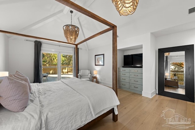 bedroom with access to outside, light hardwood / wood-style flooring, lofted ceiling with beams, and an inviting chandelier