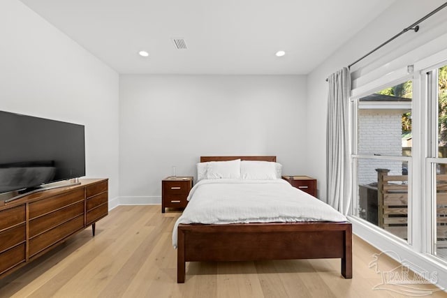 bedroom featuring light hardwood / wood-style floors