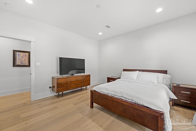 bedroom featuring light hardwood / wood-style floors