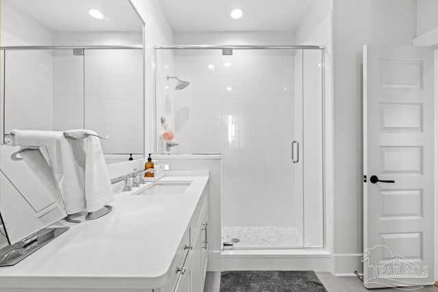 bathroom featuring vanity and walk in shower