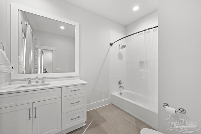 bathroom featuring tile patterned floors, vanity, and shower / bath combination with curtain