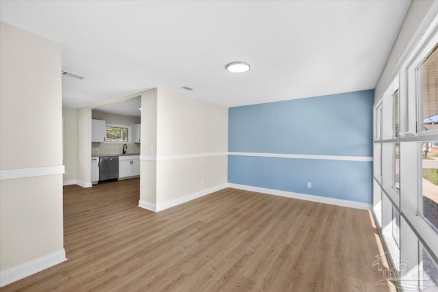 empty room with light wood-type flooring