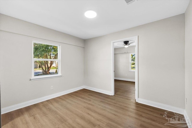 empty room featuring hardwood / wood-style floors