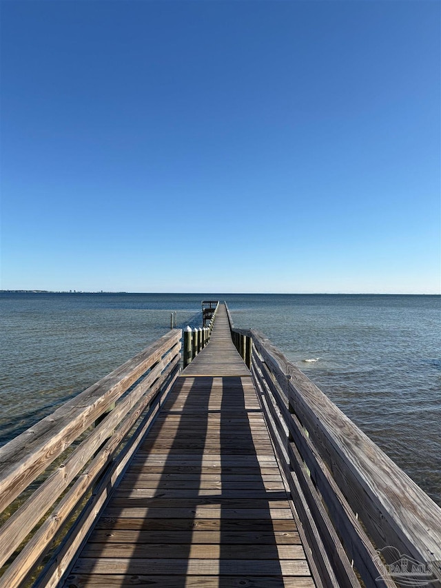 dock area featuring a water view