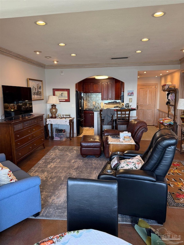 living room with crown molding