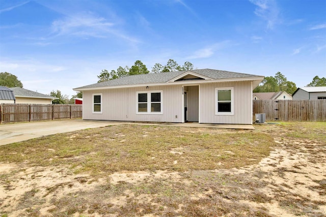 view of front facade with central AC and a patio area