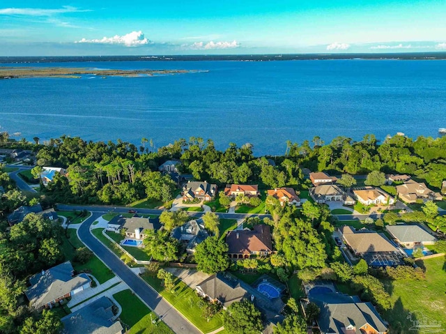 bird's eye view with a water view