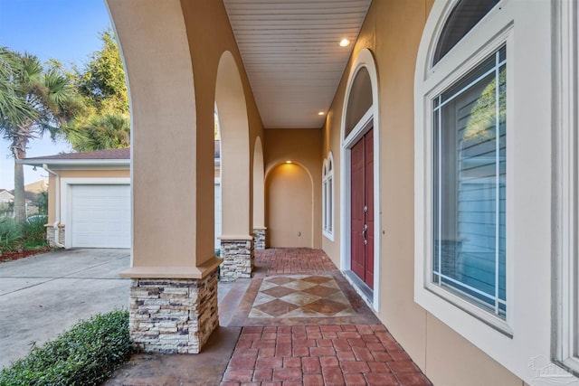 entrance to property featuring a garage