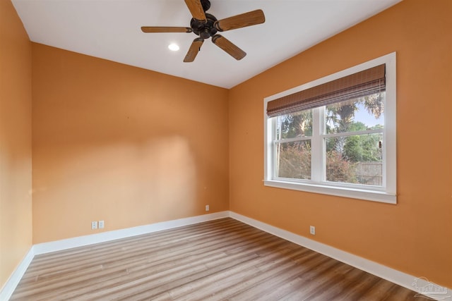 unfurnished room with light hardwood / wood-style flooring and ceiling fan