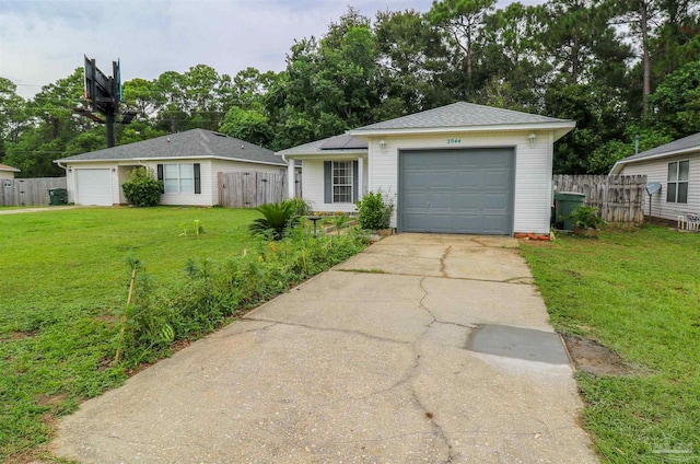 single story home with a front yard and a garage