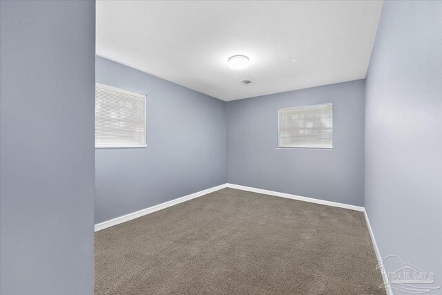931 Pocahontas Dr, Ft Walton Beach, FL 32547 - unfurnished room with carpet floors and a healthy amount of sunlight