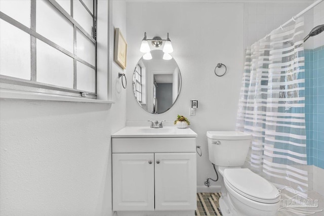 931 Pocahontas Dr, Ft Walton Beach, FL 32547 - bathroom with a shower with curtain, vanity, and toilet