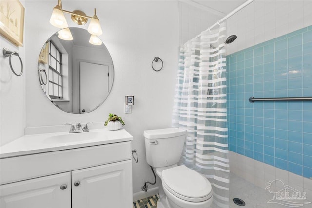 931 Pocahontas Dr, Ft Walton Beach, FL 32547 - bathroom featuring a shower with shower curtain, vanity, and toilet