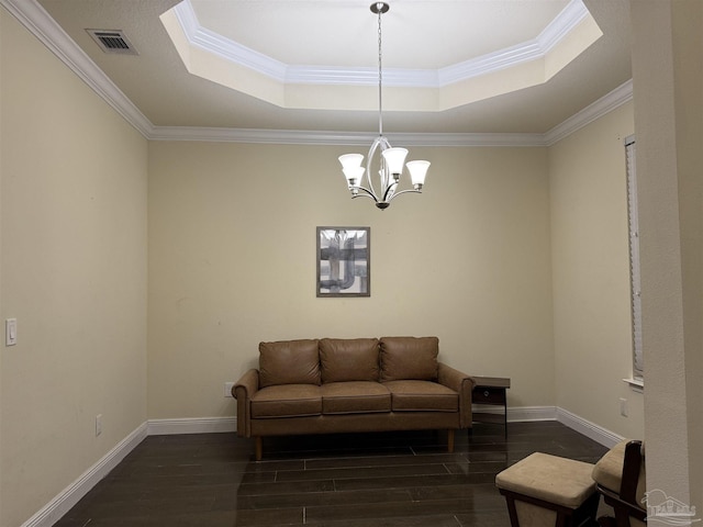 living area with dark wood-type flooring, a raised ceiling, crown molding, and baseboards