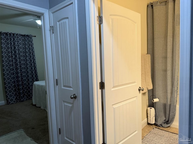 bathroom featuring tile patterned flooring