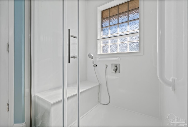 bathroom with walk in shower