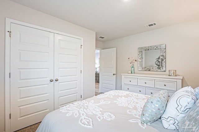 8815 Longmont Way, Milton, FL 32583 - bedroom with a closet and visible vents