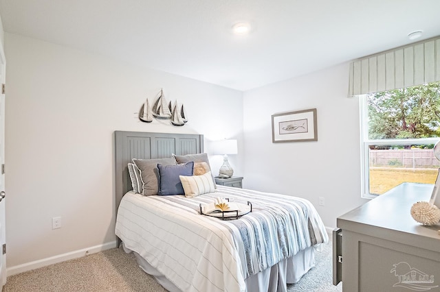 8815 Longmont Way, Milton, FL 32583 - bedroom featuring light carpet and baseboards