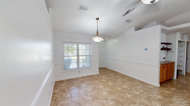 4901 Mason Calle, Gulf Breeze, FL 32563 - spare room featuring vaulted ceiling and baseboards