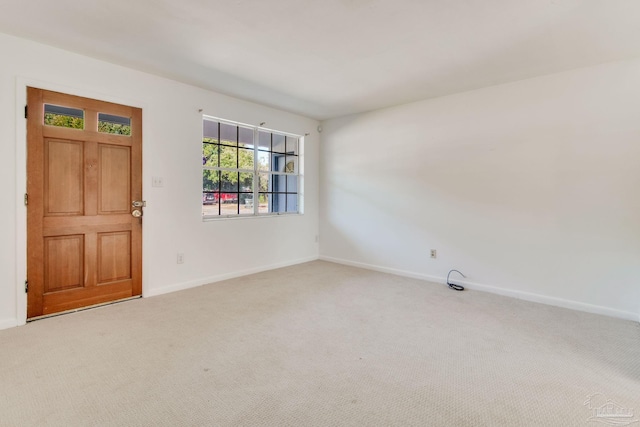 spare room featuring carpet flooring