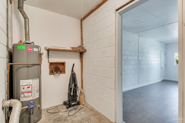 utility room with gas water heater