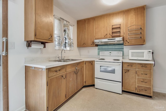 kitchen with sink and white appliances