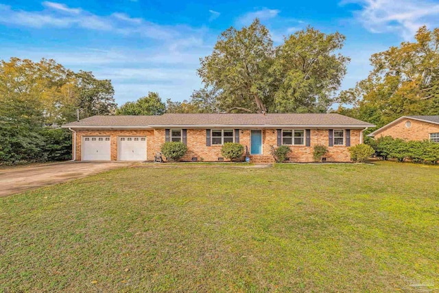 ranch-style home with a garage and a front yard