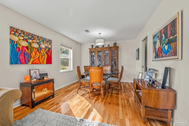 dining room featuring light wood-type flooring