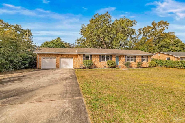 ranch-style home featuring a garage and a front yard