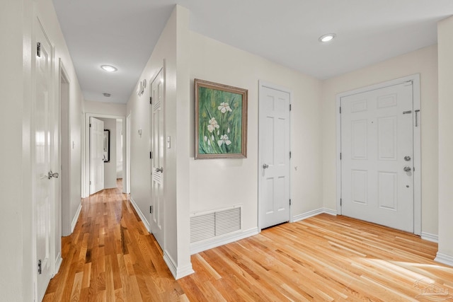 entrance foyer with light wood-type flooring