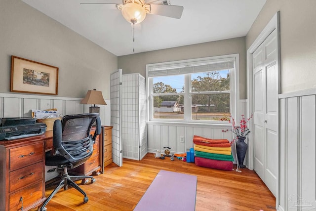 office featuring ceiling fan and light hardwood / wood-style floors