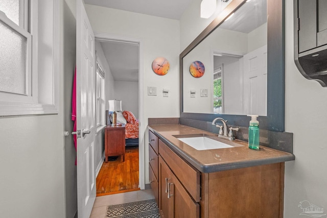 bathroom featuring vanity and tile patterned flooring