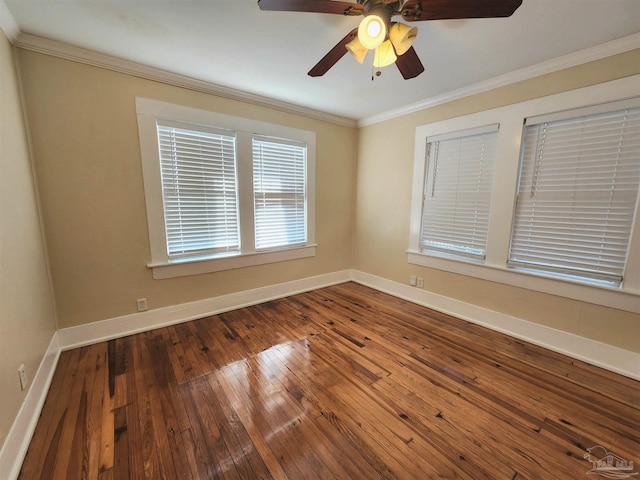 unfurnished room with baseboards, ceiling fan, hardwood / wood-style floors, and crown molding