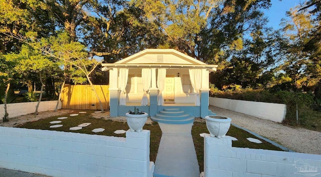 view of outdoor structure featuring an outdoor structure and fence