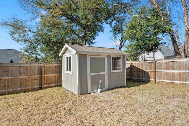 view of outdoor structure with a lawn