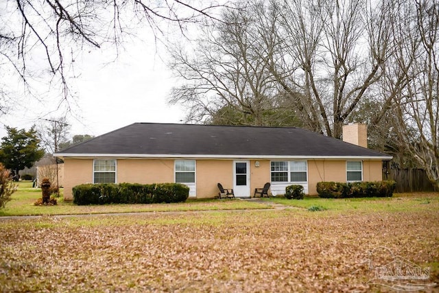 view of front of house with a front yard