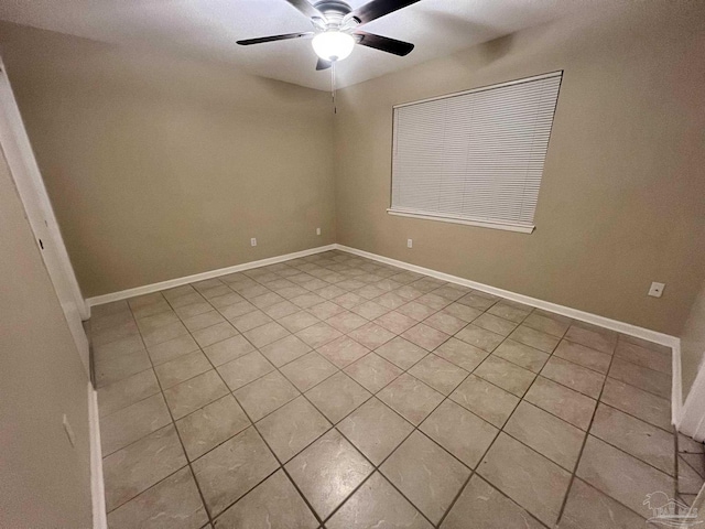 unfurnished room featuring light tile patterned flooring and ceiling fan