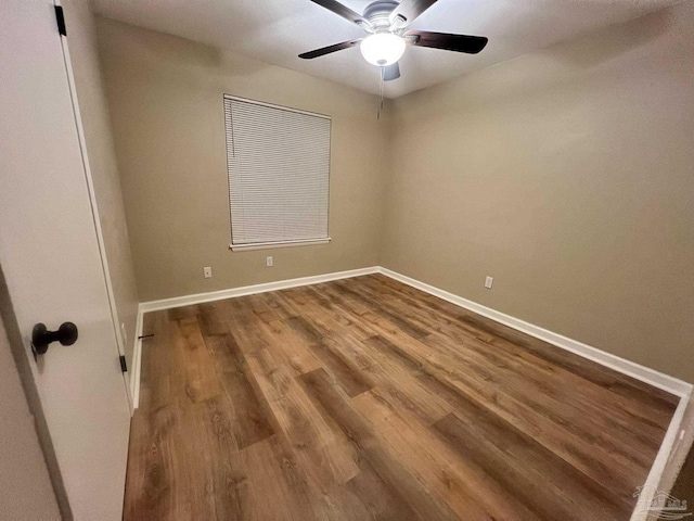 unfurnished room featuring ceiling fan and hardwood / wood-style floors