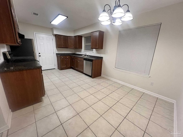 kitchen with refrigerator, dishwasher, sink, hanging light fixtures, and stove