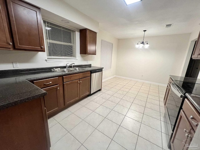 kitchen featuring sink, hanging light fixtures, stainless steel appliances, dark brown cabinets, and an inviting chandelier