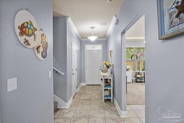 3920 Shady Grove Dr, Pace, FL 32571 - entryway with ornamental molding, a textured wall, and baseboards