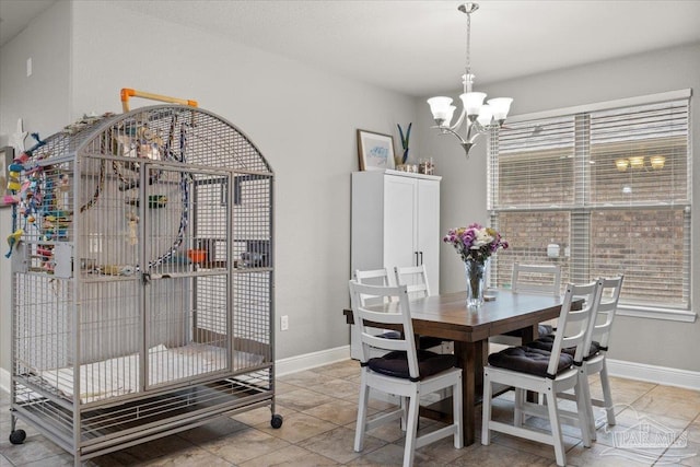 3920 Shady Grove Dr, Pace, FL 32571 - dining space with a chandelier and baseboards