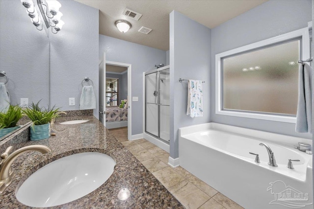 3920 Shady Grove Dr, Pace, FL 32571 - full bath featuring a garden tub, a stall shower, and double vanity
