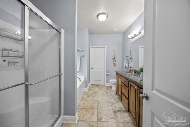 3920 Shady Grove Dr, Pace, FL 32571 - full bath featuring a shower stall, double vanity, toilet, a garden tub, and baseboards