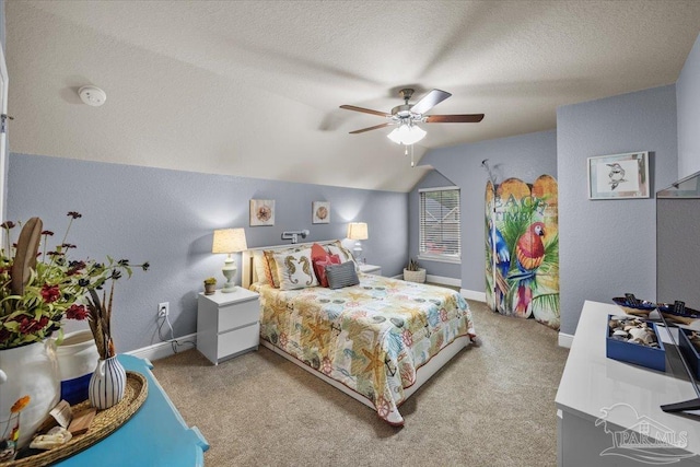 3920 Shady Grove Dr, Pace, FL 32571 - bedroom with baseboards, light carpet, lofted ceiling, a textured ceiling, and a ceiling fan
