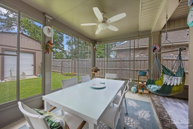 3920 Shady Grove Dr, Pace, FL 32571 - sunroom featuring a ceiling fan and outdoor dining space
