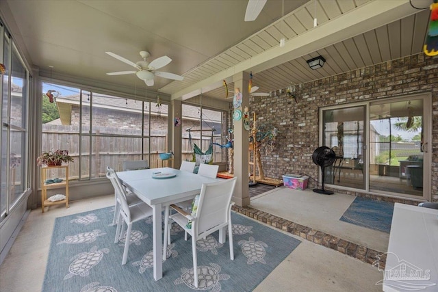 3920 Shady Grove Dr, Pace, FL 32571 - sunroom with ceiling fan and outdoor dining area