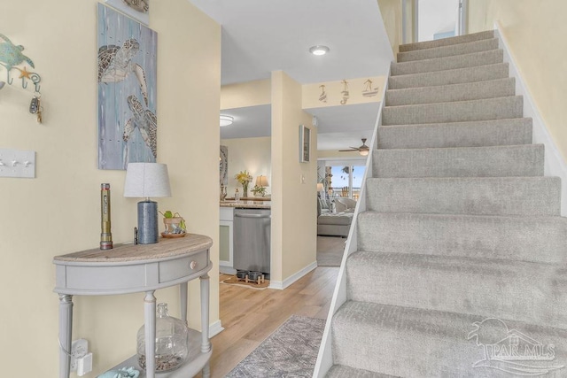 10443 Gulf Beach Hwy Unit 1, Pensacola, FL 32507 - stairway with baseboards, wood finished floors, and ceiling fan