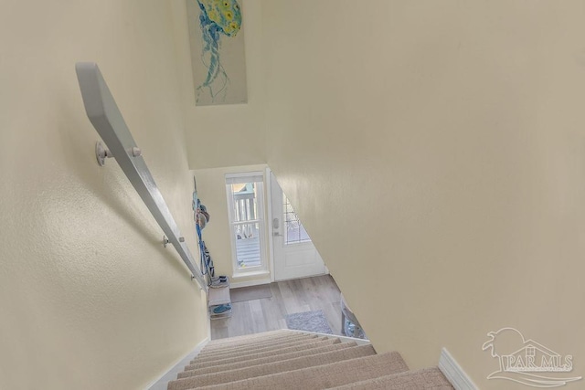 10443 Gulf Beach Hwy Unit 1, Pensacola, FL 32507 - staircase with wood finished floors