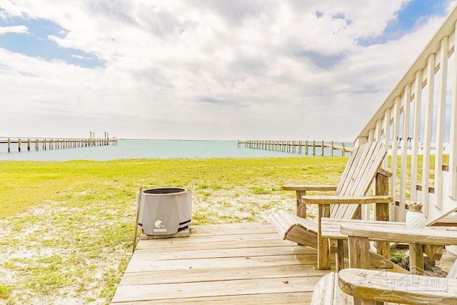 10443 Gulf Beach Hwy Unit 1, Pensacola, FL 32507 - deck with a water view and a lawn
